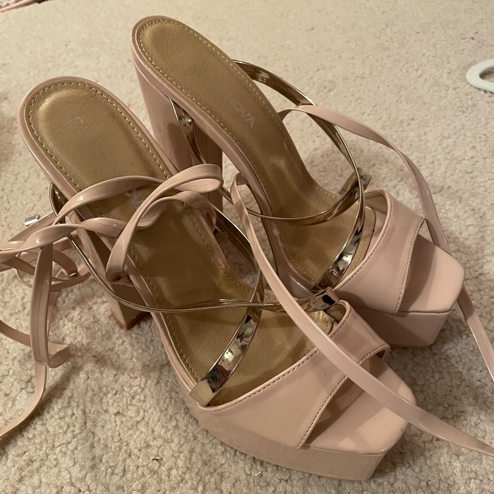 Cream platform heels with gold accents